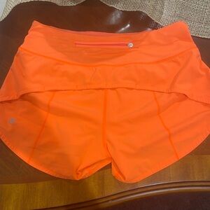Lululemon low-rise speed up shorts bright orange fluorescent
